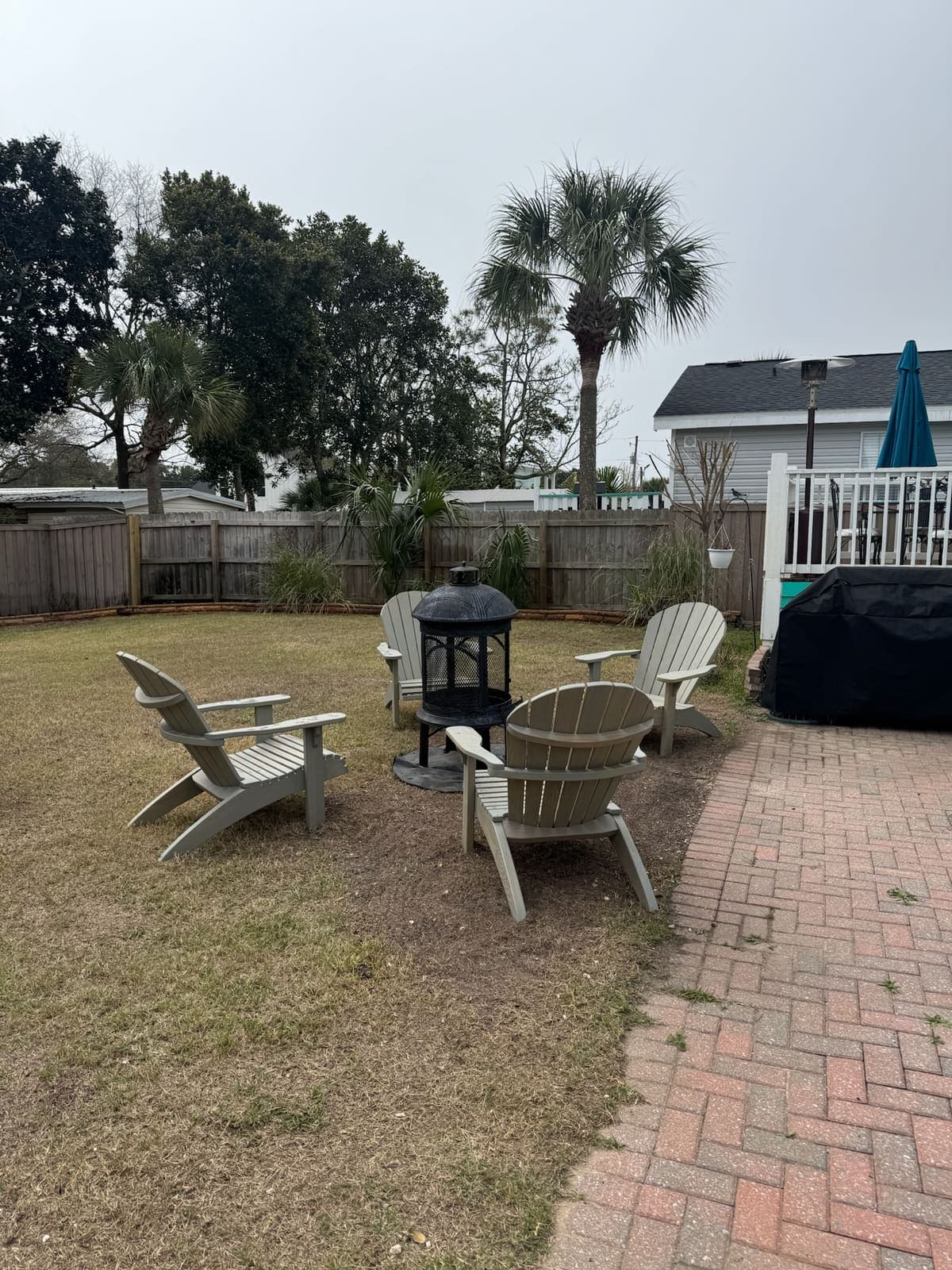 Fire pit with Adirondack chairs